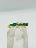 Anillo de oro de 18K con esmeraldas y diamantes certificados