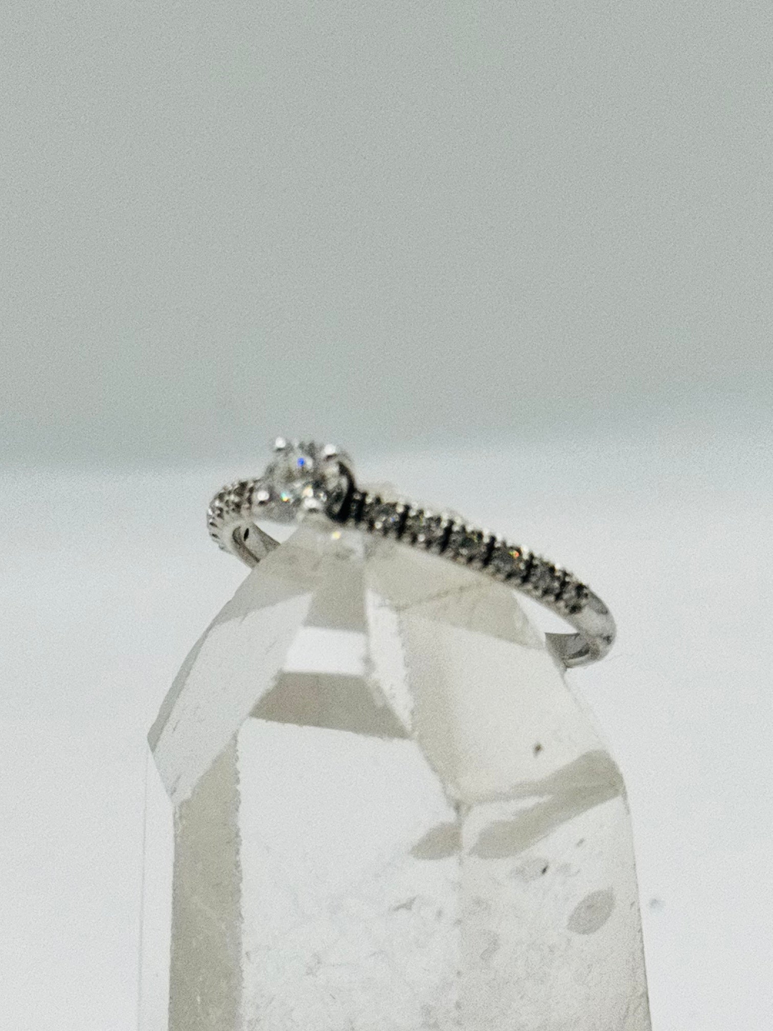 18K White Gold Ring with Center Diamond and Half Eternity Band