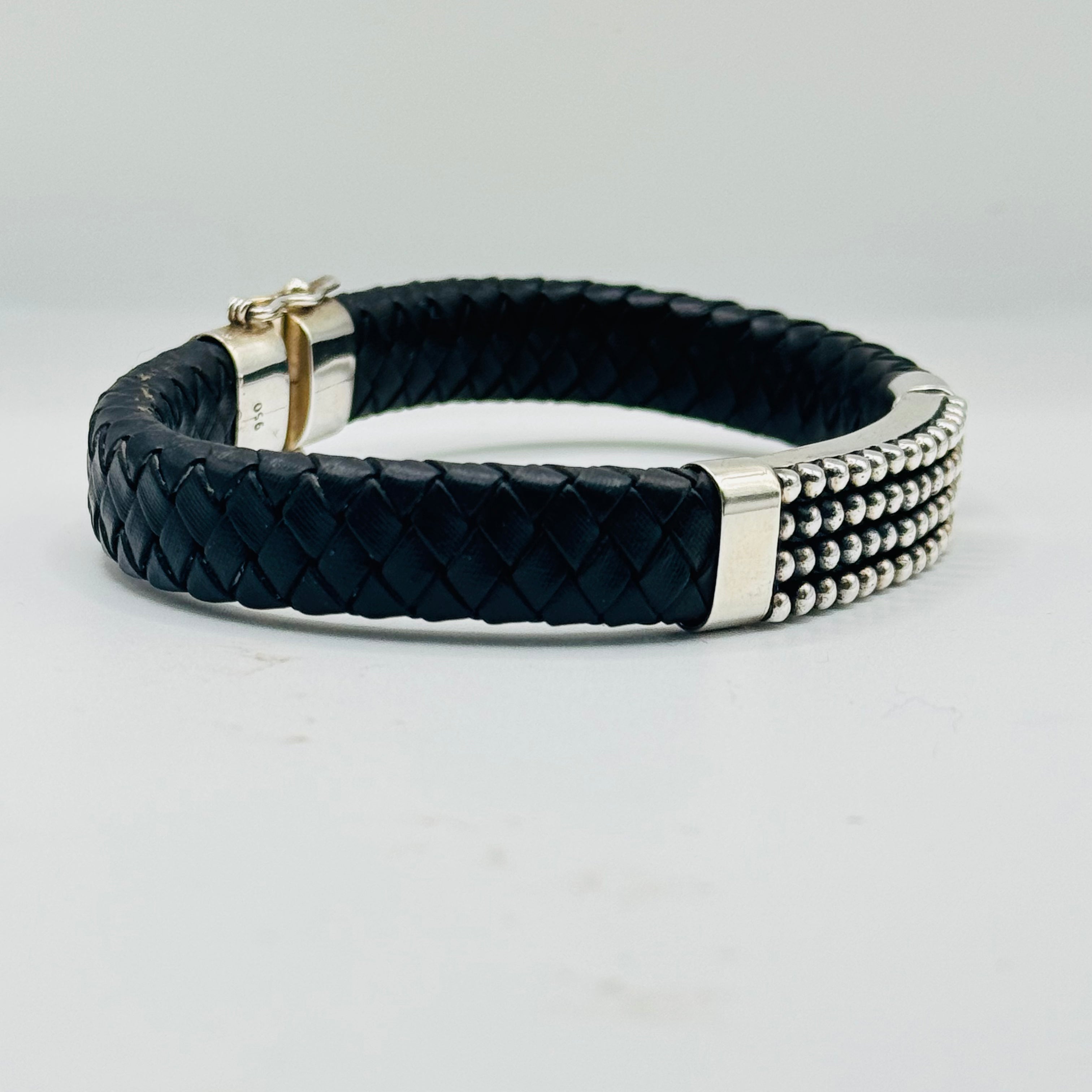 Pulsera para hombre de cuero trenzado y plata de ley 950 con detalles atrevidos