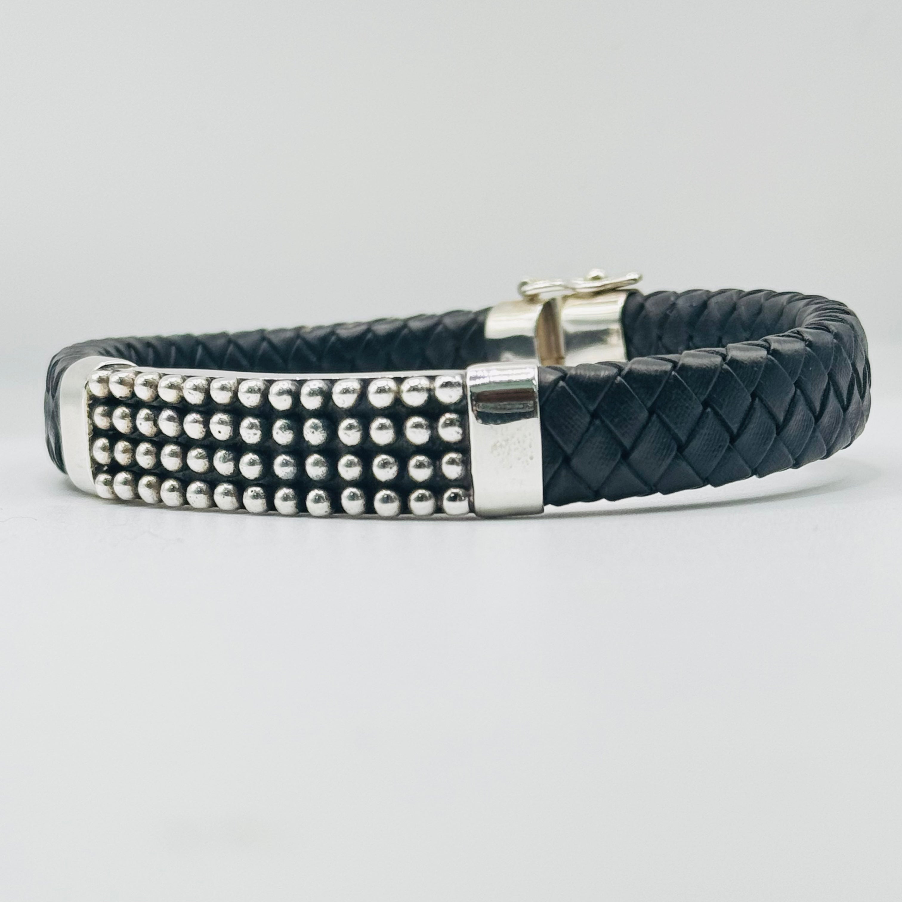 Pulsera para hombre de cuero trenzado y plata de ley 950 con detalles atrevidos